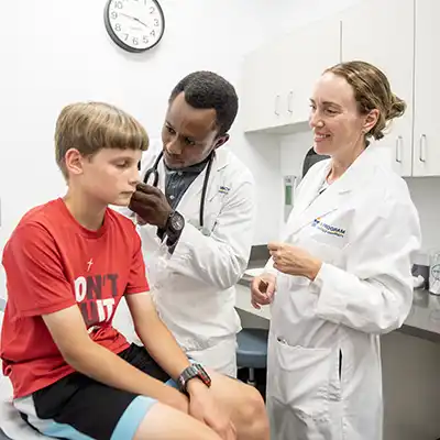 Youth being treated by a Physician Assistant.