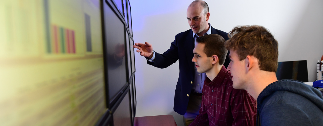 Dr. Seth Hamman with cyber operations students