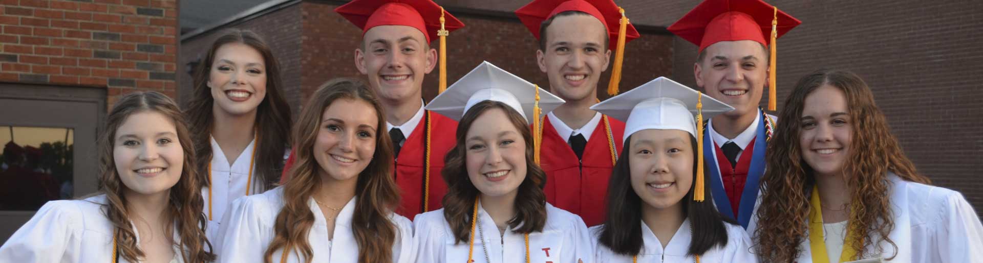 Nine graduates from Bethesda Christian School at their high school graduation.