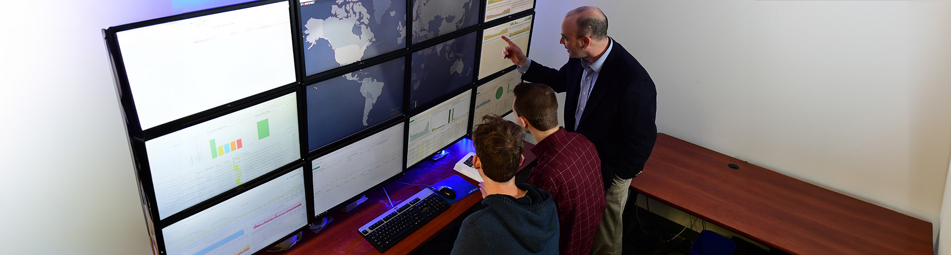 Dr. Seth Hamman leads students is a cybersecurity exercise.
