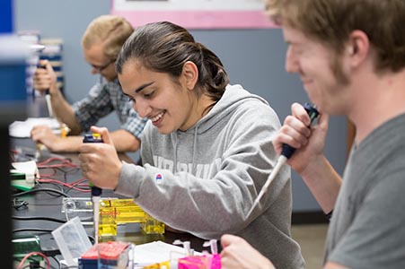 student in a science lab