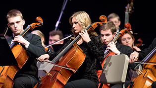 Students playing in the orchestra