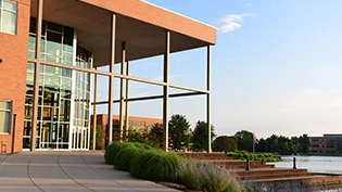 Exterior view of the BTS building adjacent to the Cedar Lake.
