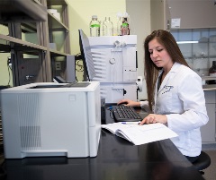 Pharmacy graduate student in the lab.
