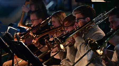 Group of musicians playing trombone in the Jazz Band
