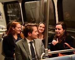 DCSemesterfourstudentsontheMetrotraintalking