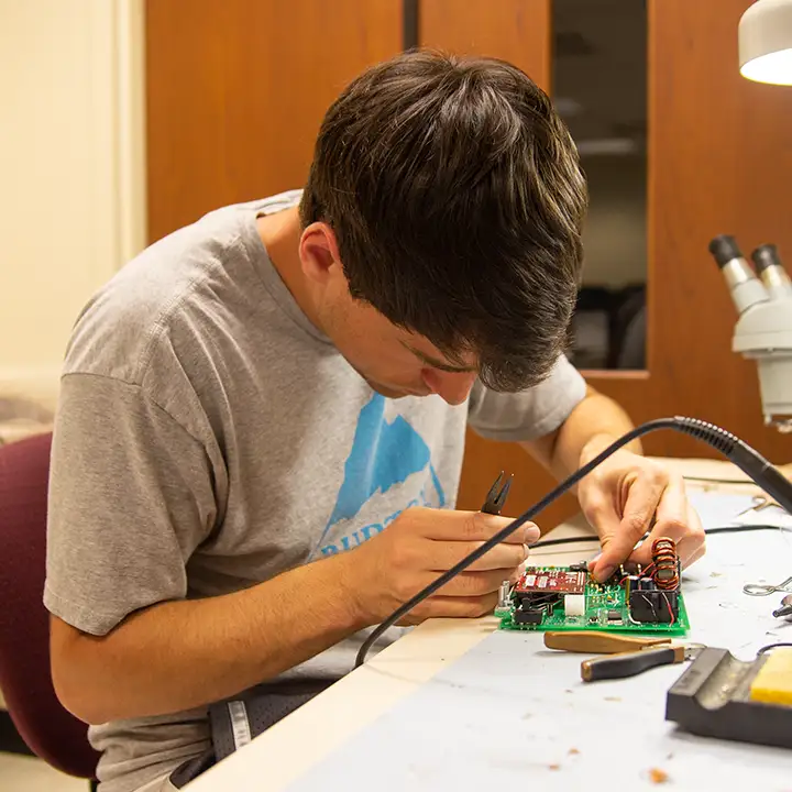 Man working on electronics